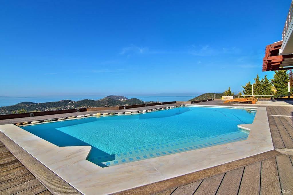 Villa Takeoff Saronida อานาวีซอส ภายนอก รูปภาพ